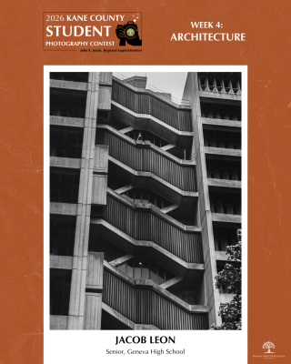 Black and white photo of a building's exterior stairwell with angular, zigzagging concrete